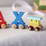 Engraved New Baby Wooden Name Train Set, thumbnail 3 of 12