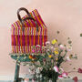 Decorative Reed Basket, Pink And Orange Stripe, thumbnail 1 of 6
