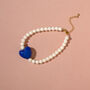 Cream Bead And Blue Heart Bracelet, thumbnail 1 of 3