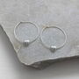 Sliding Heart Silver Hoop Earrings, thumbnail 1 of 8