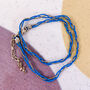 Braided Friendship Bracelet With Tiny Cross Charm, thumbnail 2 of 2