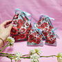 Organic Cotton Red Dianthus Reusable Pouch With Eco Satin Ribbon, thumbnail 2 of 7