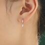 Tiny Moonstone Huggie Hoop Earrings, thumbnail 2 of 10