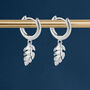 Sterling Silver Huggie Hoop Earrings With Tropical Palm Leaf Charms, thumbnail 1 of 10