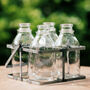 Set Of Four Vintage Style Mini Milk Bottles In A Crate, thumbnail 1 of 3