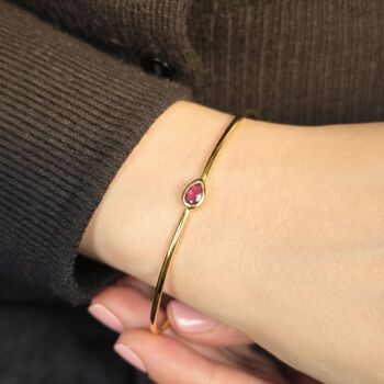 Gold Plated Minimalist Ruby July Birthstone Bangle, 3 of 5