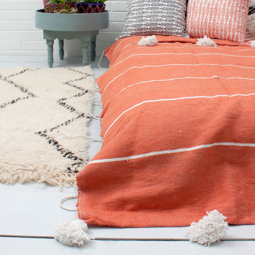 moroccan handwoven tassel stripe pom pom blanket by bohemia