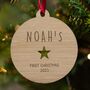 Personalised Baby's First Christmas Wooden Bauble, thumbnail 1 of 5