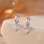 Dangling Highland Cow Huggie Hoops, thumbnail 1 of 12