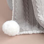 Personalised Grey Knitted Blanket With Pom Pom, thumbnail 7 of 8