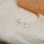 Tiny Crescent Moon Stud Earrings In Sterling Silver, thumbnail 2 of 6