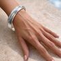 Solid Silver Battered Twist Bangle, thumbnail 1 of 4