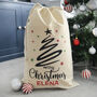 Personalised Christmas Tree Black Swirl Cotton Sack, thumbnail 1 of 3