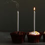 G Decor Set Of Twelve Silver Skinny Cake Candles, thumbnail 1 of 7