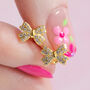 Gold Bow Stud Earrings, thumbnail 1 of 6
