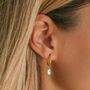 March Birthstone Aquamarine Gold Plated Huggie Hoop Earrings, thumbnail 1 of 12