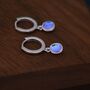 Sterling Silver Dangling Moonstone Oval Hoop Earrings, thumbnail 1 of 10