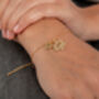 Gold Plated Paw Print And Initial Bracelet, thumbnail 2 of 3