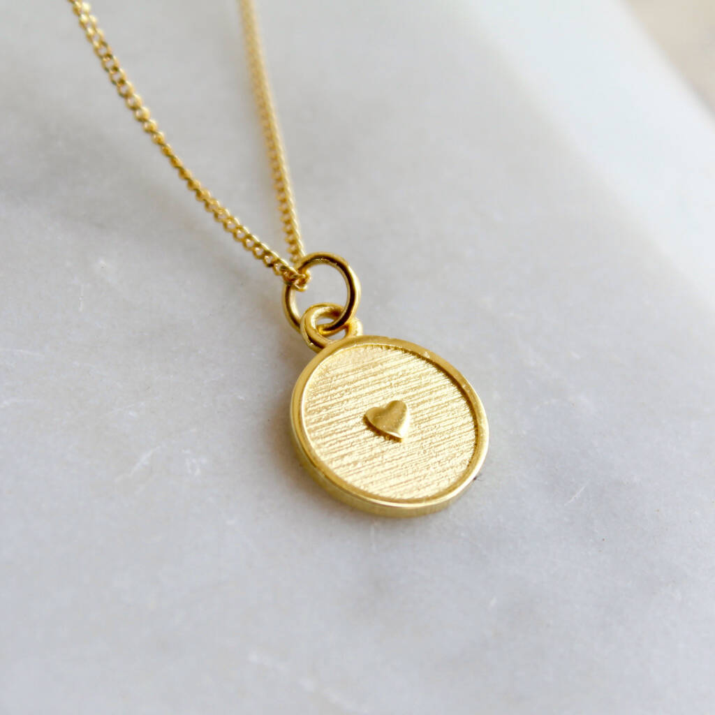 gold vermeil medallion necklace with inset heart by lime tree design