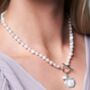 Vita Pearl Necklace With Silver Cherry Blossom Charm, thumbnail 1 of 4