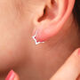 Sterling Silver Star Huggie Earrings, thumbnail 1 of 7