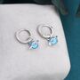 Sterling Silver Blue Opal Planet And Star Huggie Hoop Earrings, thumbnail 1 of 10