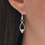 Sterling Silver Dangly Simple Celtic Loop Earrings, thumbnail 1 of 6
