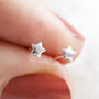 Tiny Sterling Silver Star Stud Earrings, thumbnail 1 of 3