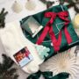 Luxury Christmas Pyjama Gift Set For Her – Festive Green Satin Pjs, Candle, Socks And Hair Bow, thumbnail 1 of 9