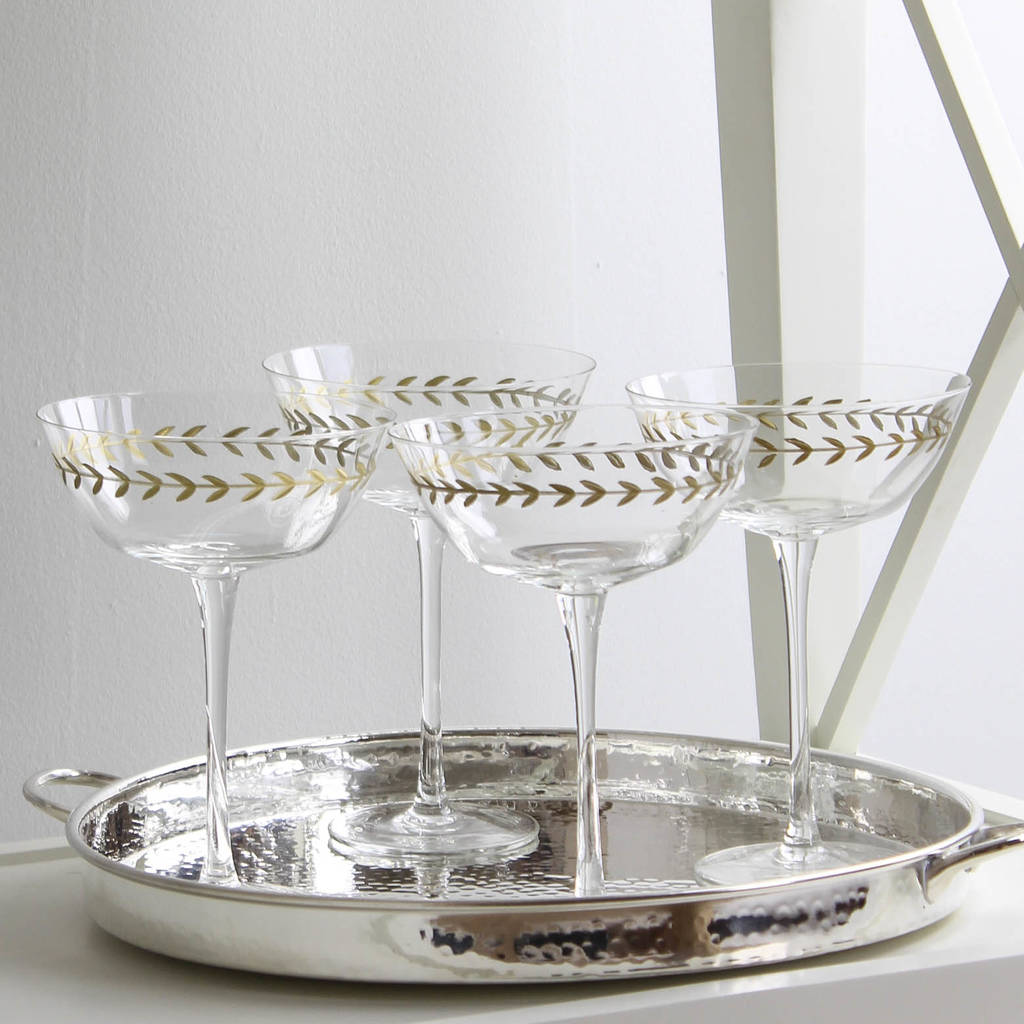 four gold laurel wreath champagne saucers by marquis & dawe