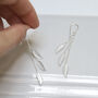 Sterling Silver Cascading Feather Dangly Earrings, thumbnail 1 of 5