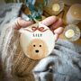 Personalised Christmas Dog And Bow Ceramic Tree Decoration, thumbnail 1 of 11