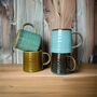Set Of Four Reactive Glaze Mugs In Lagoon Glazes, thumbnail 1 of 9