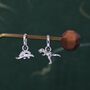 Sterling Silver Mismatched Dinosaur Dangle Hoop Earrings, thumbnail 1 of 10