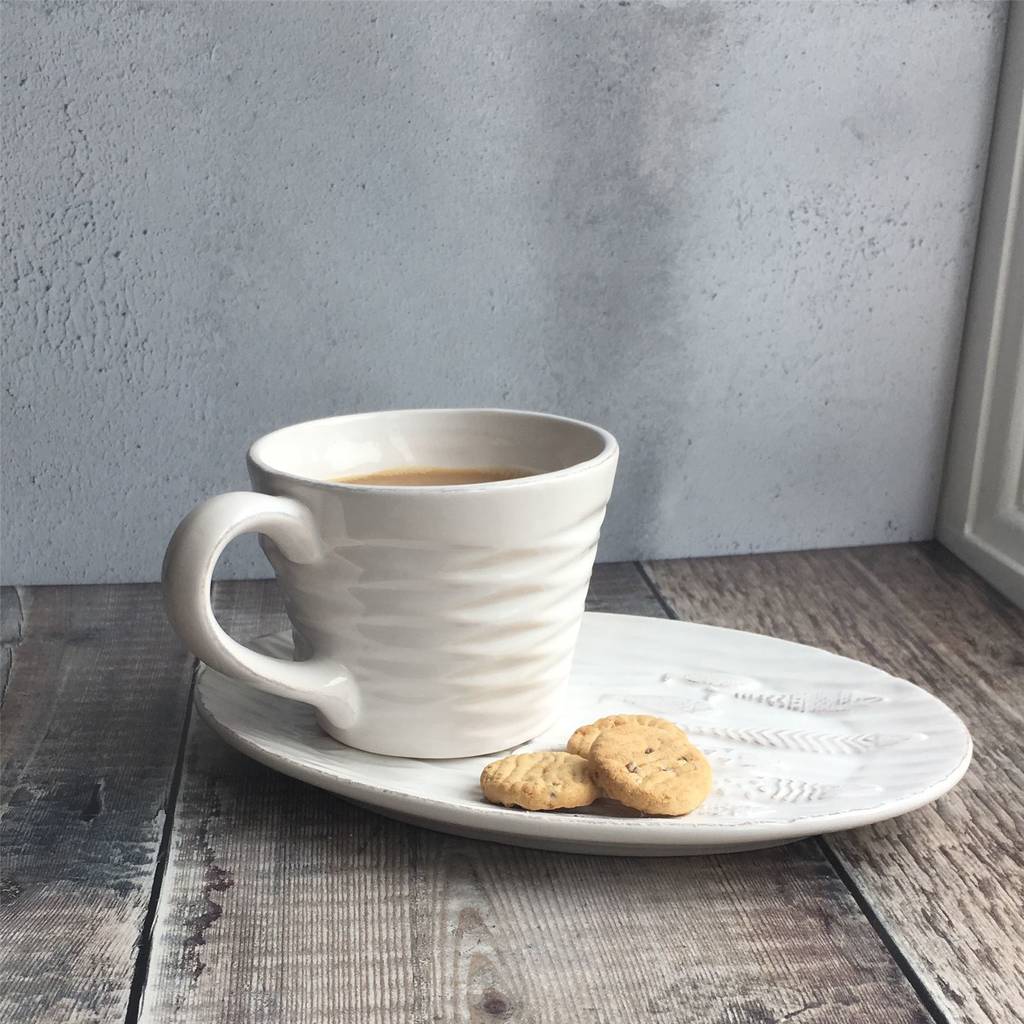 fish mug and plate set by the nautical home