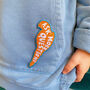 Embroidered 'Ask More Questions' Sew On Parrot Badge, thumbnail 4 of 5