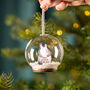 Personalised Illustrated Penguin First Christmas Snow Bauble, thumbnail 1 of 7