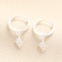 Tiny Star Charm Huggie Hoop Earrings In Silver Plating, thumbnail 1 of 3
