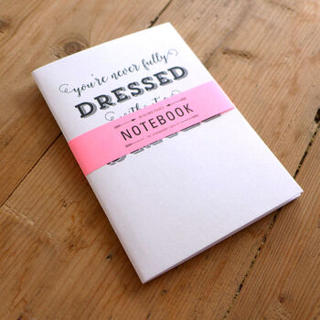 You're Never Fully Dressed Without A Smile A6 Notebook, 4 of 7