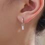 Sterling Silver Baguette Cz Huggie Hoop Earrings, thumbnail 2 of 12