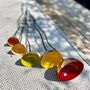 Set Of Five Copper Rain Catchers – Tangerine, Green, Red, Orange And Yellow Cups On Curved Iron Pole, thumbnail 6 of 6