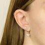 Sterling Silver Huggie Hoop Earrings With Bee Charm, thumbnail 4 of 9