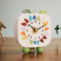 Small Clock With Bright Rainbow Coloured Petals, thumbnail 1 of 8
