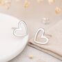 Sterling Silver Asymmetric Heart Stud Earrings, thumbnail 1 of 9