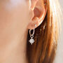 Sterling Silver North Star Charm Hoop Earrings, thumbnail 1 of 6