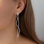 Long Drop Wavy Rod Crystal Earrings, thumbnail 1 of 3