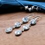 Sterling Silver Triple Blue Topaz Dangly Earrings, thumbnail 3 of 4