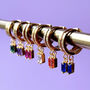 Gold Plated Huggie Hoop Earrings With Baguette Stones, thumbnail 1 of 12