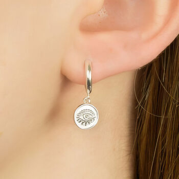 Sterling Silver Huggie Hoop Earrings With Evil Eye Protection Charms, 2 of 8