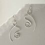 Sterling Silver Twirling Ribbon Dangly Earrings, thumbnail 3 of 4